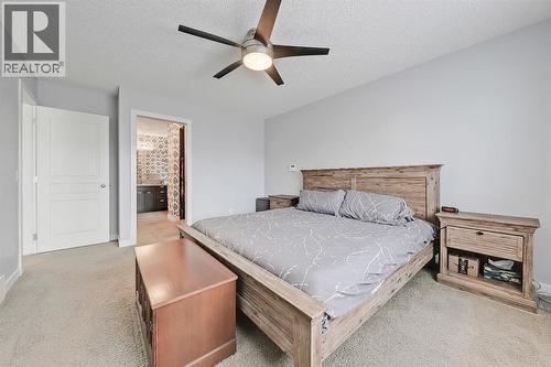 Great size for larger bedroom furniture - 9 Copperleaf Way Se, Calgary, AB - Indoor Photo Showing Bedroom