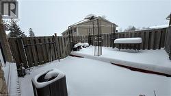 Fenced yard with a wooden deck - 