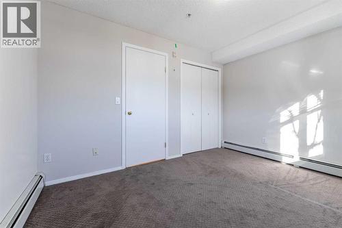 102, 1717 60 Street Se, Calgary, AB - Indoor Photo Showing Other Room