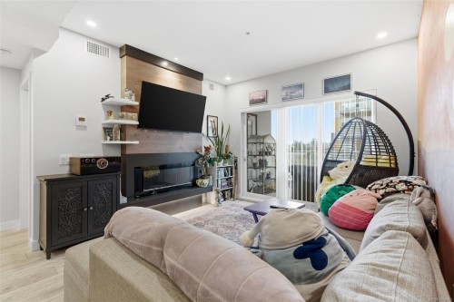 304-950 Whirlaway Cres, Langford, BC - Indoor Photo Showing Other Room With Fireplace