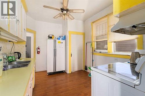 216 15 Avenue Nw, Calgary, AB - Indoor Photo Showing Kitchen With Double Sink