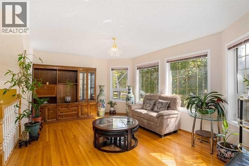 218 15 Avenue Nw, Calgary, AB - Indoor Photo Showing Living Room With Fireplace