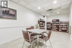 Dining room with a paneled ceiling, visible vents, baseboards, and recessed lighting - 