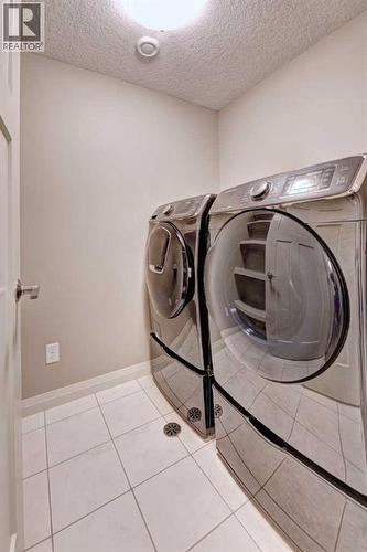 70 Masters Crescent Se, Calgary, AB - Indoor Photo Showing Laundry Room