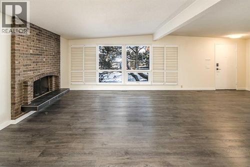 4712 Vegas Road Nw, Calgary, AB - Indoor With Fireplace