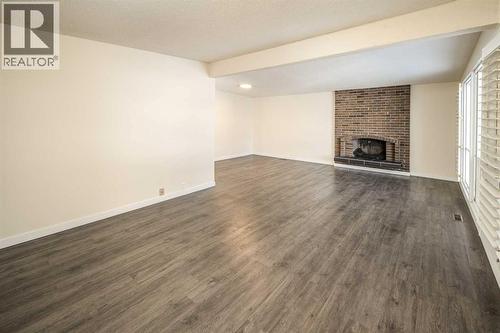 4712 Vegas Road Nw, Calgary, AB - Indoor With Fireplace