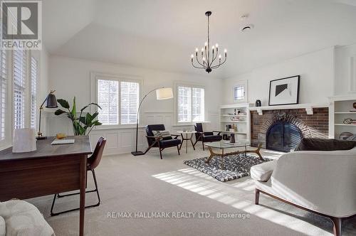 19 Whitney Avenue, Toronto, ON - Indoor Photo Showing Other Room With Fireplace