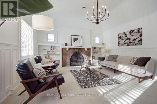 19 Whitney Avenue, Toronto, ON - Indoor Photo Showing Living Room With Fireplace