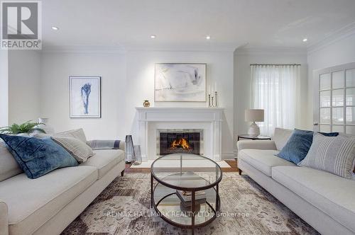 19 Whitney Avenue, Toronto, ON - Indoor Photo Showing Living Room With Fireplace