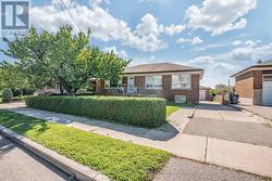 12 ERIE STREET  Toronto, ON M6L 2P7