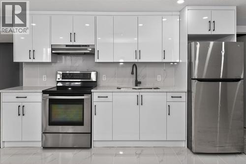 432 Ogden Drive Se, Calgary, AB - Indoor Photo Showing Kitchen With Upgraded Kitchen