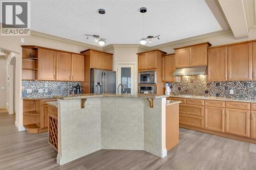 100 Cougarstone Manor Sw, Calgary, AB - Indoor Photo Showing Kitchen With Upgraded Kitchen