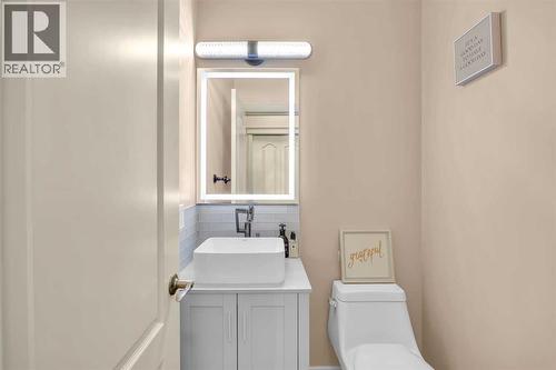 100 Cougarstone Manor Sw, Calgary, AB - Indoor Photo Showing Laundry Room