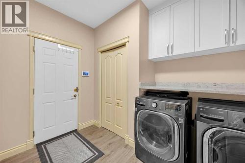 100 Cougarstone Manor Sw, Calgary, AB - Indoor Photo Showing Laundry Room