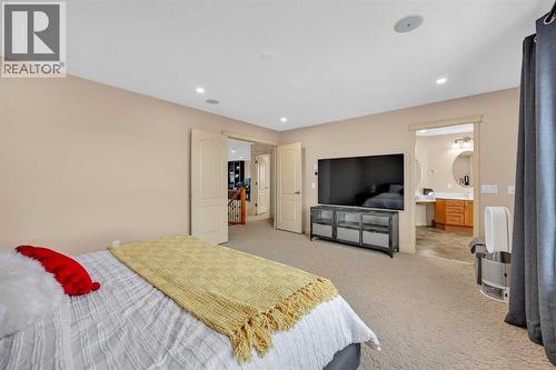 100 Cougarstone Manor Sw, Calgary, AB - Indoor Photo Showing Bedroom