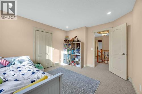 100 Cougarstone Manor Sw, Calgary, AB - Indoor Photo Showing Bedroom
