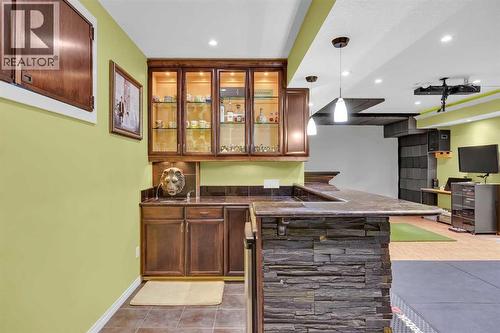 100 Cougarstone Manor Sw, Calgary, AB - Indoor Photo Showing Other Room