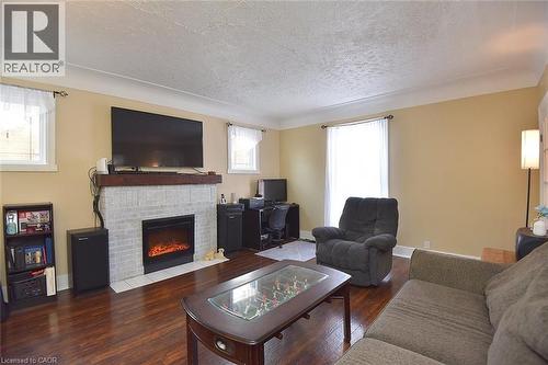 19 East 17Th Street, Hamilton, ON - Indoor Photo Showing Living Room With Fireplace