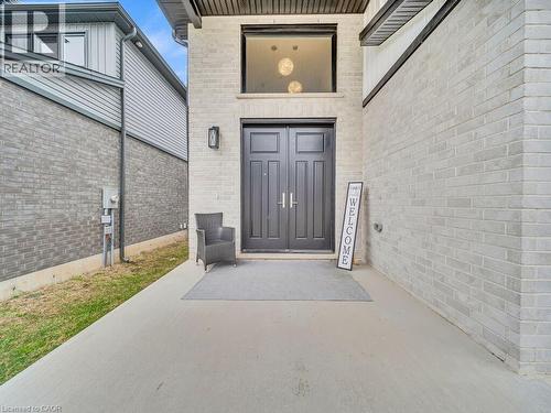 Property entrance featuring brick siding - 3374 Oriole Drive, London, ON - Outdoor With Exterior