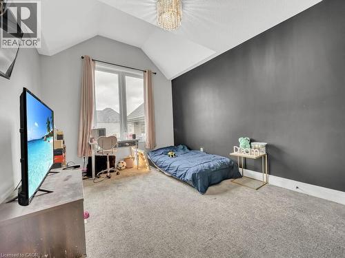 Bedroom featuring carpet flooring and lofted ceiling - 3374 Oriole Drive, London, ON - Indoor Photo Showing Bedroom