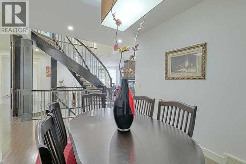 16 Rockcliff Point Nw, Calgary, AB - Indoor Photo Showing Dining Room