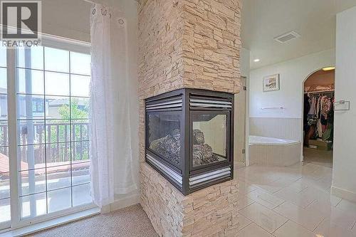 16 Rockcliff Point Nw, Calgary, AB - Indoor Photo Showing Other Room