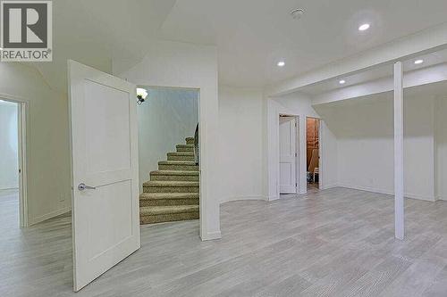 16 Rockcliff Point Nw, Calgary, AB - Indoor Photo Showing Other Room
