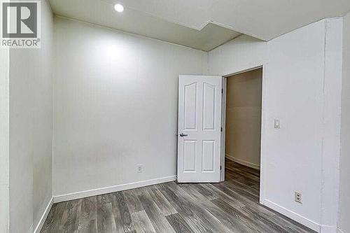 16 Rockcliff Point Nw, Calgary, AB - Indoor Photo Showing Other Room