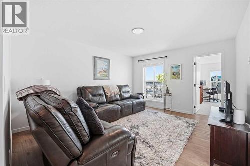 102 Setonstone Manor Se, Calgary, AB - Indoor Photo Showing Living Room