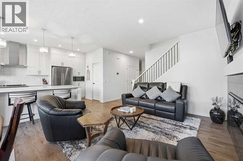 102 Setonstone Manor Se, Calgary, AB - Indoor Photo Showing Living Room