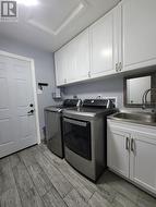 Main floor Laundry and Garage Access - 