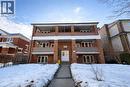 View of front of home with brick siding, a balcony, and french doors - 17 Louisa Street, Kitchener, ON  - Outdoor With Facade 
