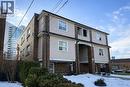 View of front facade featuring brick siding and a balcony - 17 Louisa Street, Kitchener, ON  - Outdoor 
