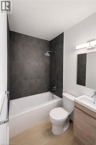 Bathroom featuring  shower combination and vanity - 17 Louisa Street, Kitchener, ON - Indoor Photo Showing Bathroom