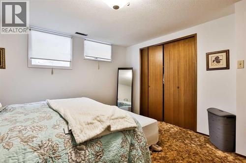 1813 Elm Road S, Lethbridge, AB - Indoor Photo Showing Bedroom