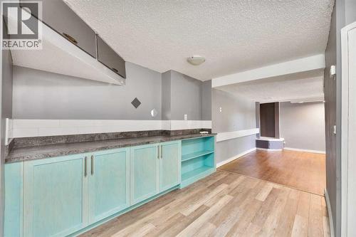 Kitchen - 4908 23 Avenue Nw, Calgary, AB - Indoor Photo Showing Other Room