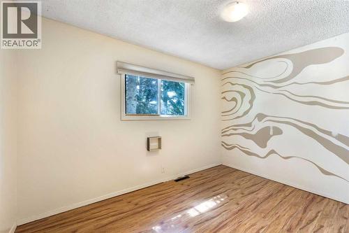 Bedroom 1 - 4908 23 Avenue Nw, Calgary, AB - Indoor Photo Showing Other Room