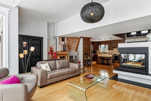Salon - 35 Rue D'Arvida, Granby, QC - Indoor Photo Showing Living Room With Fireplace