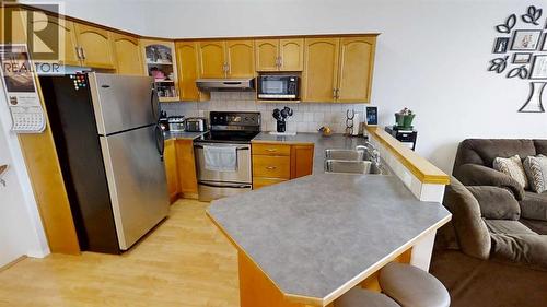 624 51 Avenue, Coalhurst, AB - Indoor Photo Showing Kitchen With Double Sink