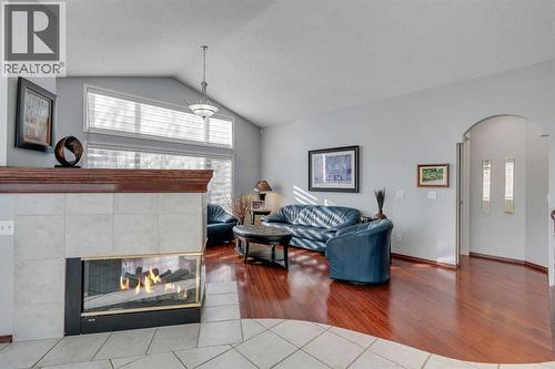 78 Mckenzie Lake Place Se, Calgary, AB - Indoor Photo Showing Living Room With Fireplace