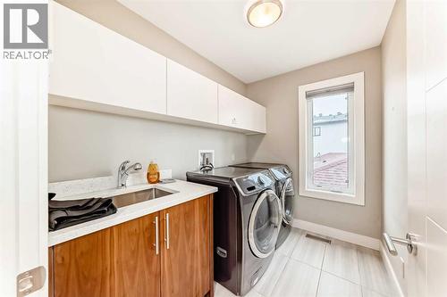2614 21 Street Sw, Calgary, AB - Indoor Photo Showing Laundry Room