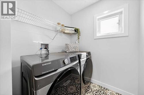 Laundry room - 7 Lakewood Point, Strathmore, AB - Indoor Photo Showing Laundry Room