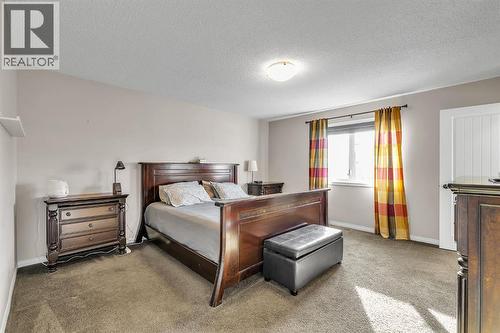 31 Walden Court Se, Calgary, AB - Indoor Photo Showing Bedroom