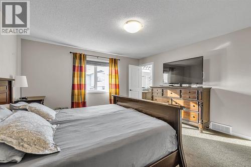31 Walden Court Se, Calgary, AB - Indoor Photo Showing Bedroom