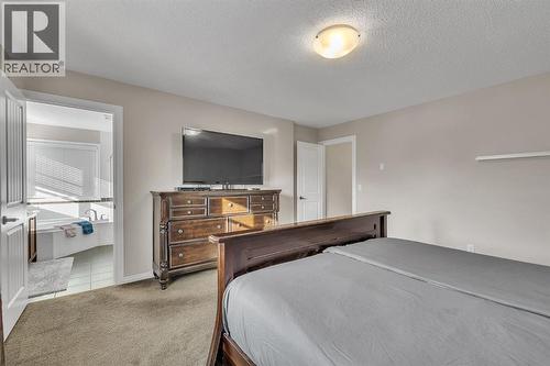 31 Walden Court Se, Calgary, AB - Indoor Photo Showing Bedroom