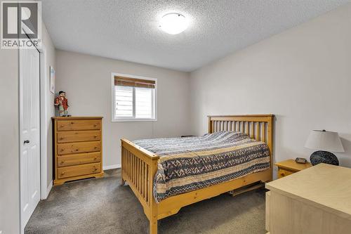 31 Walden Court Se, Calgary, AB - Indoor Photo Showing Bedroom