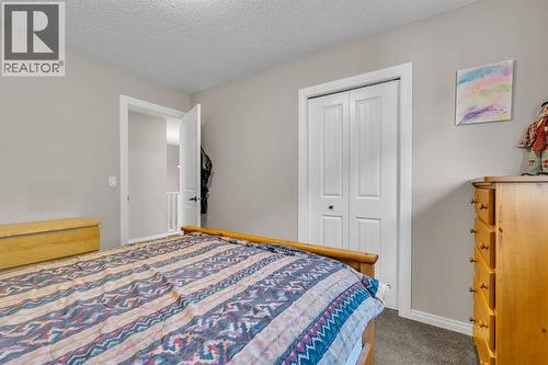 31 Walden Court Se, Calgary, AB - Indoor Photo Showing Bedroom