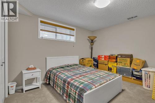 31 Walden Court Se, Calgary, AB - Indoor Photo Showing Bedroom