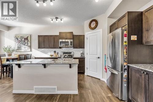 31 Walden Court Se, Calgary, AB - Indoor Photo Showing Kitchen With Stainless Steel Kitchen With Upgraded Kitchen