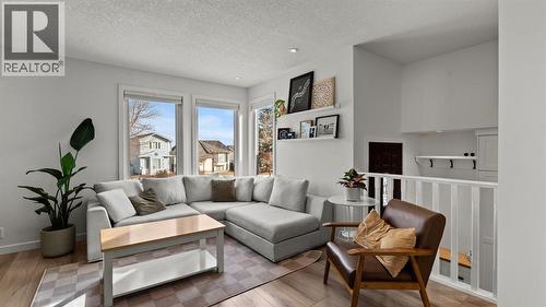 161 Macewan Glen Drive Nw, Calgary, AB - Indoor Photo Showing Living Room